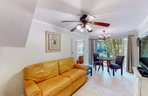 Riviera Beach Apartment | Sunny abode with shared pool & grill access - well-equipped kitchen, AC, and W/D