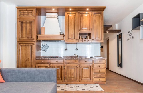 Ragoli Apartment | Sunny apartment in Giuma with mountain views and balcony