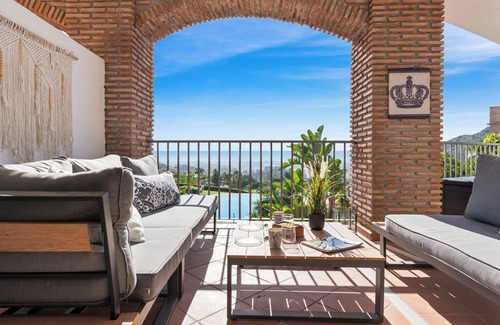 Benahavis Apartment | Sunny balcony with pool by Costarentals - Ref M52