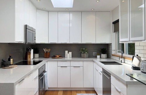 Delta House | Sunny Coastal Home in a vibrant ocean side community.