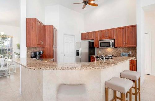 Pelican Villa | Sunny Days - Spacious Villa with Saltwater Heated Pool 4 bedroom 2 bathroom