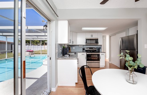 Jasmine Estates House | Sunny Escape: Vibrant Pool Home
