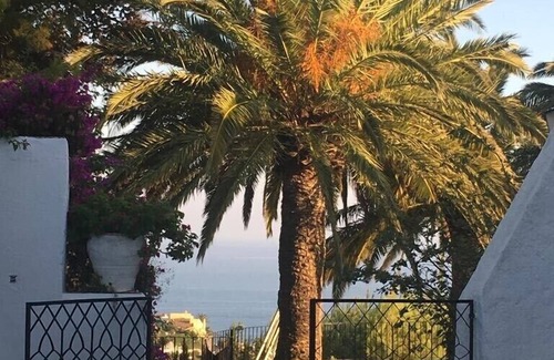 Benalmadena Villa | Sunny family home w/andalusian courtyard, private pool & tennis. Pet-Friendly!