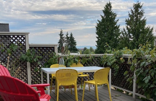 Green Lake House | Sunny Green Lake cottage with roof deck and Rainier views
