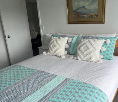 Nelson Apartment | Sunny hillside central Nelson hideaway with city to sea views