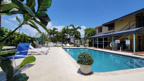 South Palm Park Neighborhood Association Hotel | Sunny Palms Inn