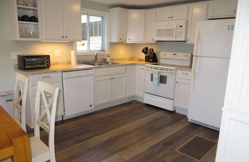 Yarmouth House | Sunny Seaside Cottage with Beautiful Sunset Views