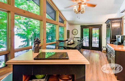 Seguin Cottage | Sunrises! Hot tub! Outdoor Kitchen! Spacious beach! Multiple outdoor fire pits!