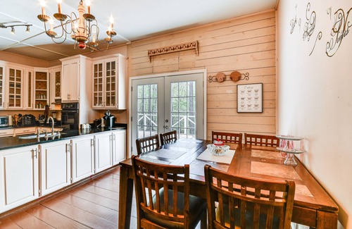 Tallassee House | Sunroom & Decks: Family Home in Tallassee!