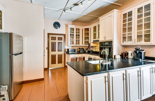Tallassee House | Sunroom & Decks: Family Home in Tallassee!