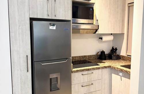 Coco Condo | Sunscape Second Floor Condo with Rooftop