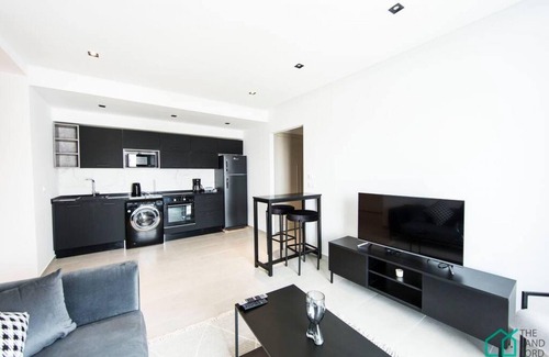 Les Berges du Lac Apartment | Sunset 302 Apt de luxe avec salle de fitness