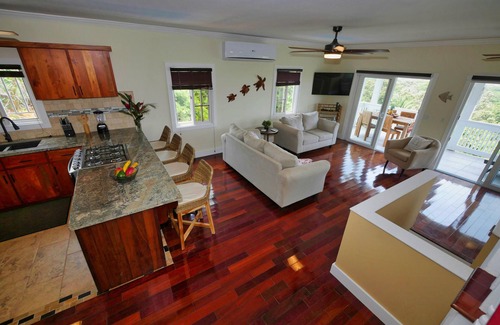 Sandy Bay House | Sunset and Ocean views at Sandy Feet Retreat with private infinity pool.