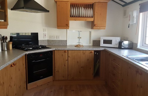 Brayford Cabin | Sunset Cabin, watch the sunset over the north Devon horizon in this cosy cabin!