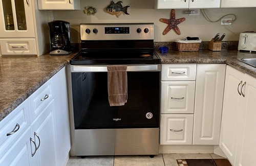Seven Mile Beach Condo | Sunset Cove 2 Bed/2Bath Condo on Seven Mile Beach with Discounted Boat Charters