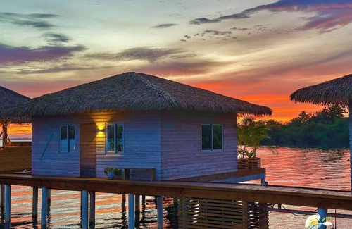 Isla Solarte House | Sunset Cove Overwater Bungalow with Bedroom, Kingbed, Living Room, Kitchen