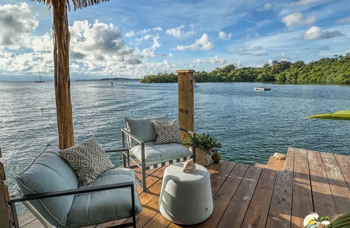 Isla Solarte House | Sunset Cove Overwater Bungalow with Bedroom, Kingbed, Living Room, Kitchen