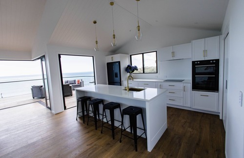 Kai Iwi House | Sunset Delight. Beautiful home with expansive sea views.