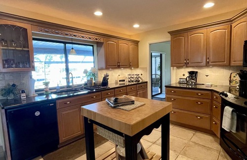 Punta Gorda House | Sunset lit sky over private pool lanai! Walk 2 town & all around! PRIME LOCATION