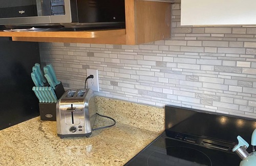 Dewittville Condo | Sunset Shores Family-Friendly Lake Condo in Mayville Pool, AC, Private Deck!