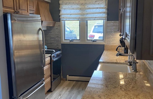 Dewittville Condo | Sunset Shores Family-Friendly Lake Condo in Mayville Pool, AC, Private Deck!