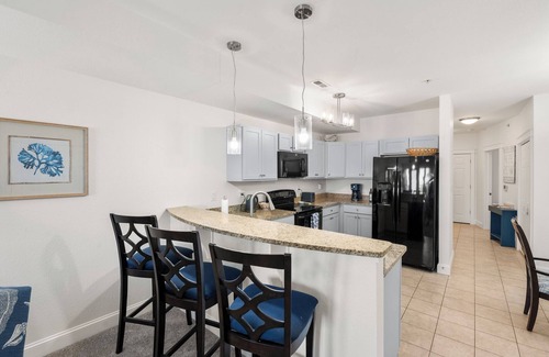 Nags Head Condo | Sunset Sound: Water Views, Shared Pool, Elevator