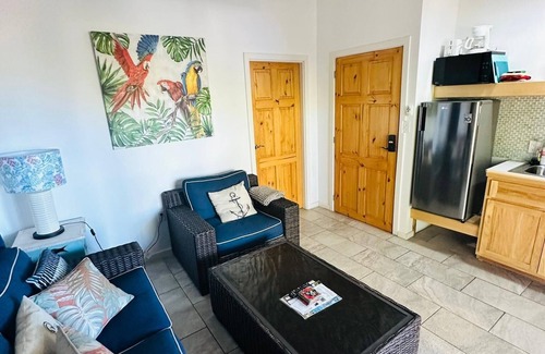Sandy Bay Hotel | Sunset View Condo @ The Blue Bahia Resort in Sandy Bay