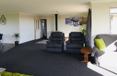 Little Wanganui House | Sunsets in paradise - your home away from home
