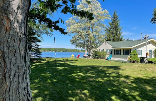 Gaylord Cottage | Sunshine Cottage on 100’ of sandy Otsego Lake. Gaylord, Mi. Boat, golf, relax