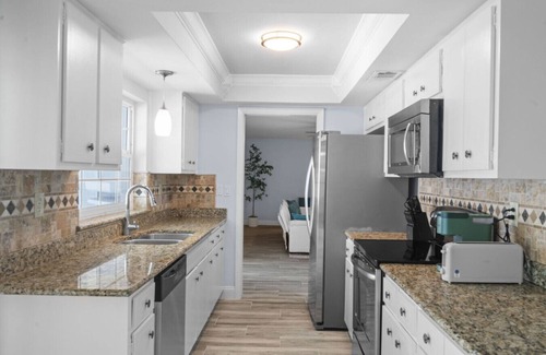 Bay Crest Park Apartment | Sunshine, Paradise! Pool, Patio, & Prime Location!