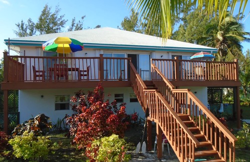 Great Exuma Apartment | SUPER BEACHFRONT- directly on HOOPERS BAY: large 4 bed 4 Bath APT for 8