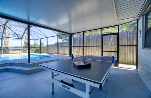 Northside House | Super Mario's Riverside Hideaway: Unique Family Fun with Pool & Games