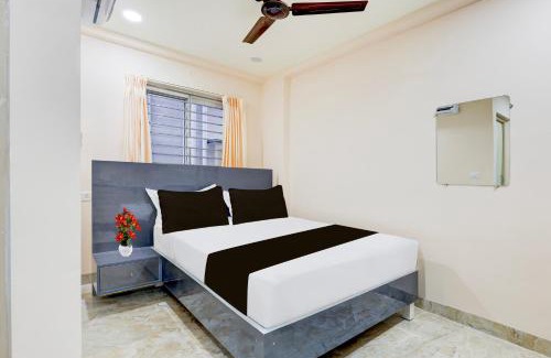 Khattalwada Hotel | Super Townhouse MVP Sector With Kailasagiri Hill View