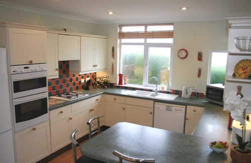 Lusty Glaze House | Superb well equipped family house in quiet area with sea views, close to beaches