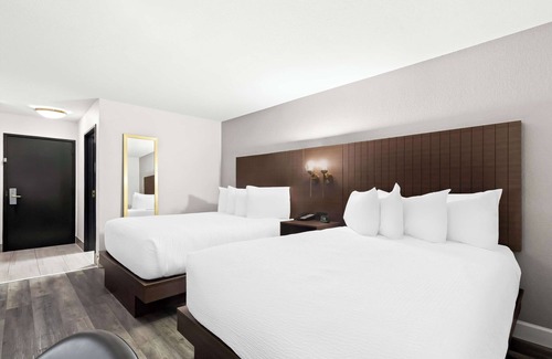 Groves Hotel | SureStay by Best Western Groves