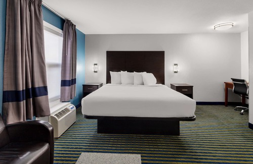 Brooks Hotel | SureStay Plus by Best Western Brooks