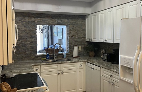 Palm Coast Condo | Surf Club I - 1107 Beautiful Ground Floor/Ocean View/Huge Patio/Wi-Fi