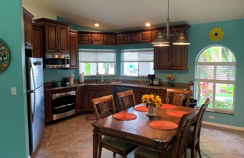 Floridana Beach House | Surfing Buddha Family Beach House - walk to beach - pet friendly