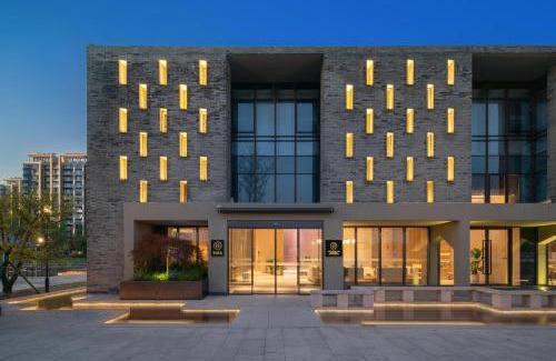Gao Xin District Hotel | Suzhou Xushuguan Blossm House