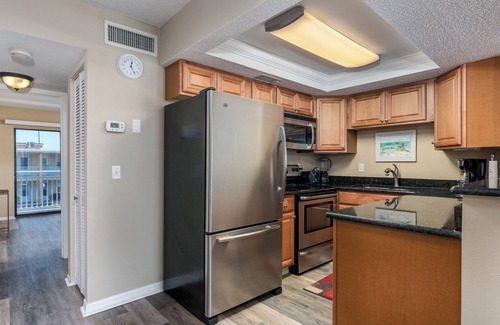 Treasure Island Condo | Swaying Palm Trees; Warm Gulf Breeze