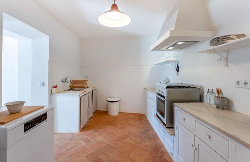 Espiche House | Sweet 2 BDR House With Patio by LovelyStay