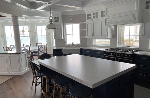 Macatawa House | Sweet Caroline . Lake MI Waterfront . Private Beach . Elevator . Sleeps 14