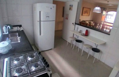 Jardim Praiano Apartment | Sweet Home Guarujá