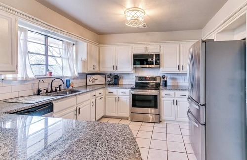 Chandler House | “Sweet Home Oklahoma” House - Large home with 4 bedrooms and fenced yard+garage!