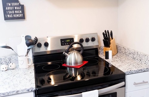 Ringgold House | Sweet Peach Bungalow 2BR + laundry. One mile from I-75 yet quiet. Newly updated.