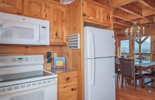 Gatlinburg - Pigeon Forge Resort | Sweet Slice of Heaven is a warm and inviting two-bedroom cabin