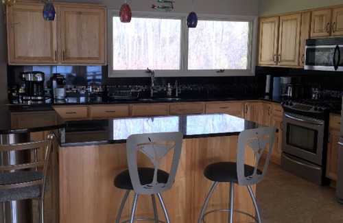 Traverse City House | Swim, Bike, Enjoy-3-bed, 4 bath lake front home in Traverse City