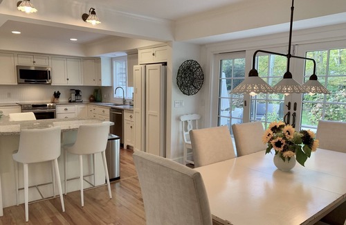 Water Mill House | Swim in a sea of hydrangeas on this peaceful, bucolic property.