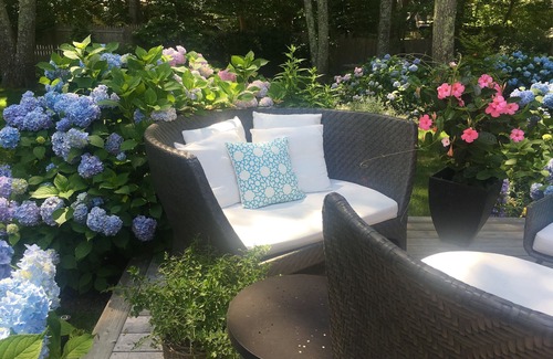 Water Mill House | Swim in a sea of hydrangeas on this peaceful, bucolic property.