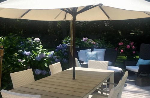Water Mill House | Swim in a sea of hydrangeas on this peaceful, bucolic property.
